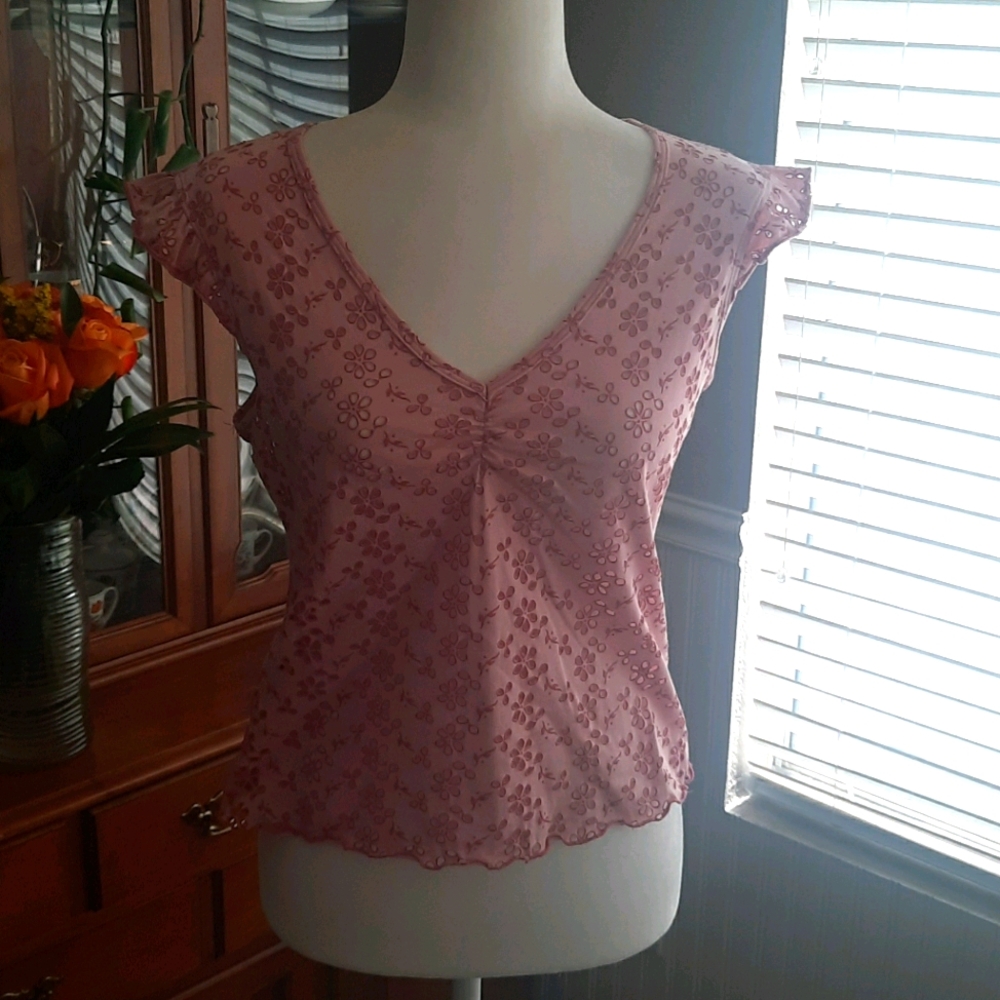 Pink top with flowered outlets top